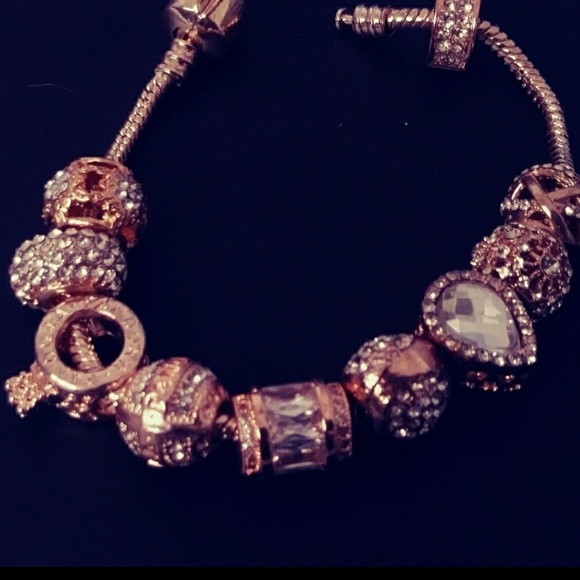Jewelry - Rose gold charm bracelet.